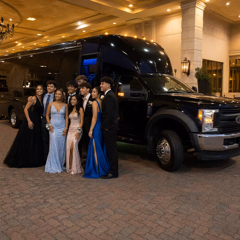 Party bus interior with wraparound leather seating and LED lighting in Cleveland