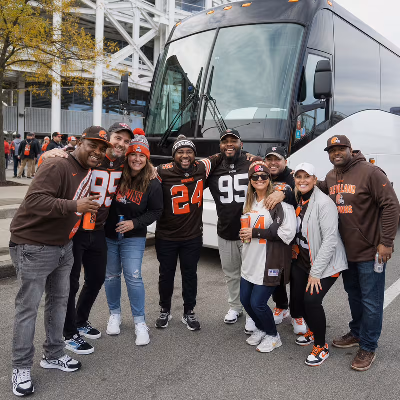 Passengers loading luggage while boarding an Cleveland group shuttle