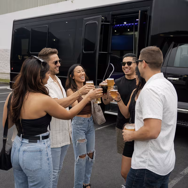 Passengers loading luggage while boarding an Cleveland group shuttle